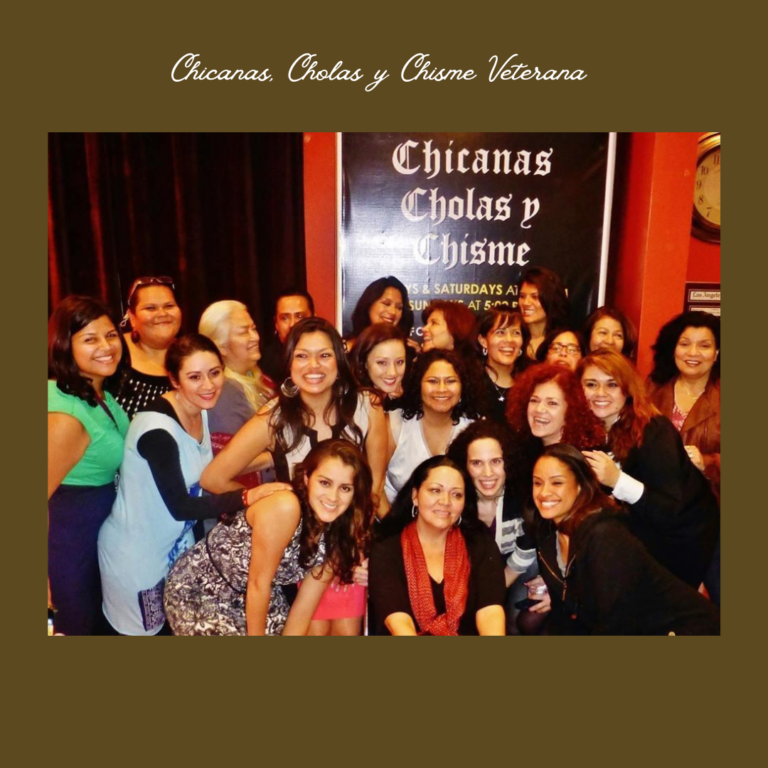 A diverse group of women pose for a group photo agains a banner that reads "Chicanas, Cholas y Chisme."